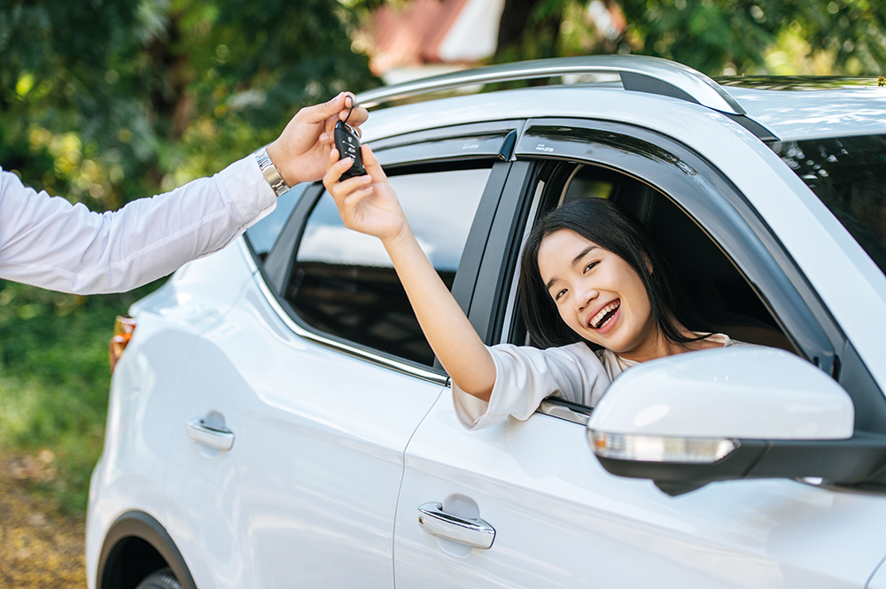woman reaching for car keys